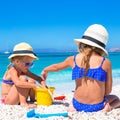 Adorable little girls at beach during summer