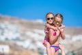 Adorable little girl at Little Venice the most popular tourist area on Mykonos island, Greece. Royalty Free Stock Photo