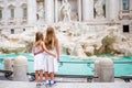 Adorable little girls near the Fountain of Trevi in Rome. Royalty Free Stock Photo