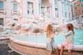 Adorable little girls near the Fountain of Trevi in Rome. Royalty Free Stock Photo