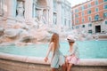 Adorable little girls near the Fountain of Trevi in Rome. Royalty Free Stock Photo