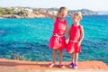 Adorable little girls at tropical beach during Royalty Free Stock Photo