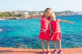 Adorable little girls at tropical beach during Royalty Free Stock Photo