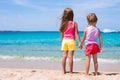 Adorable little girls at tropical beach during summer vacation Royalty Free Stock Photo