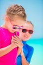 Adorable little girls at tropical beach during summer vacation Royalty Free Stock Photo