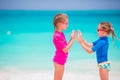 Adorable little girls at tropical beach during summer vacation Royalty Free Stock Photo