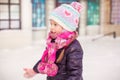 Adorable little happy girl skating on the ice-rink Royalty Free Stock Photo