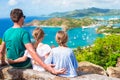 Adorable little kids and young father enjoying the view of picturesque English Harbour at Antigua in caribbean sea Royalty Free Stock Photo