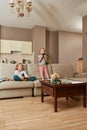 Adorable little siblings, boy and girl playing video games using game controllers at home Royalty Free Stock Photo