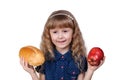 Adorable little smiling girl with red apple and bread isolated