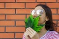 Adorable lovely girl laughing. Happy girl with autumn maple leaves