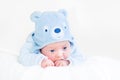 Adorable newborn baby boy in blue teddy bear hat Royalty Free Stock Photo