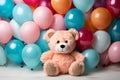 Adorable pink teddy bear plush toy surrounded by vibrant colorful pastel balloons for playtime fun