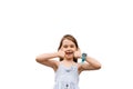 Adorable positive child girl smiling and shows thumbs up on white background in studio. Kids lifestyle and having fun Royalty Free Stock Photo