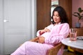 Tranquil relaxation of pregnant woman at home