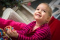 Adorable preschool girl playing with sweets