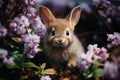 Adorable rabbit in lush green grass surrounded by beautiful lilac flowers in a serene setting