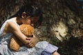 Adorable sad girl with teddy bear. Royalty Free Stock Photo