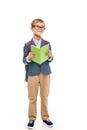 Adorable schoolboy with book