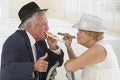 Adorable senior couple partying Royalty Free Stock Photo
