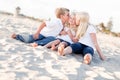 Adorable Sibling Children Kissing the Youngest Royalty Free Stock Photo