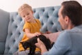 Adorable small child looking at the cat Royalty Free Stock Photo