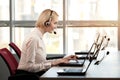 Adorable smiling female callcenter agent. Royalty Free Stock Photo