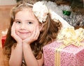 Adorable smiling little girl lying on floor Royalty Free Stock Photo
