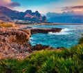 Adorable spring sunrise on Sicily, Isolidda Beach, San Vito cape, Italy, Europe. Dramatic morning seascape of Mediterranean sea.