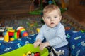 Adorable toddler with blue eyes indoor Royalty Free Stock Photo