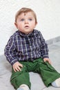 Adorable toddler with blue eyes indoor Royalty Free Stock Photo