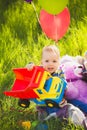 Adorable toddler boy playing toy truck Royalty Free Stock Photo