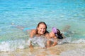 Adorable toddler girl enjoying her summer vacation at beach with Royalty Free Stock Photo