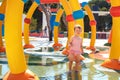Adorable toddler girl having fun in aquapark. Enjoying day trip to an aqua amusement park Royalty Free Stock Photo