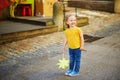 Adorable toddler girl having fun on a street of medieval town of Quimper  Brittany  France Royalty Free Stock Photo