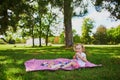 Adorable toddler girl having picnic in countryside on a summer day Royalty Free Stock Photo