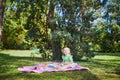 Adorable toddler girl having picnic in countryside on a summer day Royalty Free Stock Photo