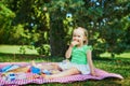 Adorable toddler girl having picnic in countryside on a summer day Royalty Free Stock Photo