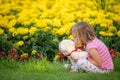 Adorable toddler girl kissing her favourite teddy bear Royalty Free Stock Photo