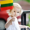 Adorable toddler girl with Lithuanian flag