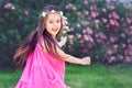 Adorable toddler girl little girl having fun outdoors and dancing latin dance Royalty Free Stock Photo