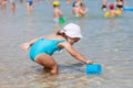 Adorable toddler girl playing with beach toys Royalty Free Stock Photo