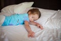 Adorable toddler taking a nap