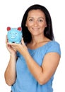 Adorable woman with a blue money-box