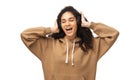 Adorable woman in casual hoodie using wireless earphones for listening music, teenager in headphones enjoying favourite