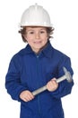 Adorable worker child with a hammer Royalty Free Stock Photo