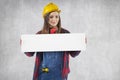 Adorable worker woman with advertising banner