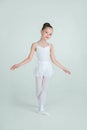 Adorable young ballerina poses on camera Royalty Free Stock Photo