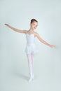 Adorable young ballerina poses on camera Royalty Free Stock Photo