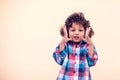 Adorable young boy surprised. Shock, amazement, surprise concept Royalty Free Stock Photo